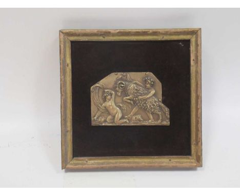A 20th century framed decorative brass plaque fragment with two figures in the form of draperied putti playing with a ram, 6.