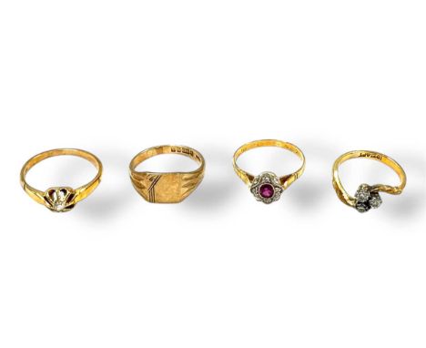 A hallmarked 18ct gold ruby cluster ring, together with two diamond set rings stamped '18CT', gross weight 7.7g, together wit