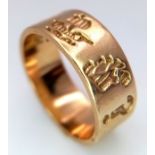 A 14K Yellow Gold Celtic Band Ring. 7mm width. 5.8g