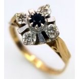 An 18K Yellow Gold Sapphire and Diamond Ring. Size L 1/2. 2.4g