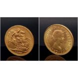 A 22K Gold 1965 Queen Elizabeth II Uncirculated Full Sovereign - In a protective capsule.