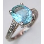 Fabulous AQUAMARINE and DIAMOND RING. Consisting a large (1 carat) Oval Cut AQUAMARINE set in SILVER