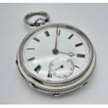 An Antique Sterling Silver Pocket Watch. Hallmarks for London 1907. White dial with second sub dial.