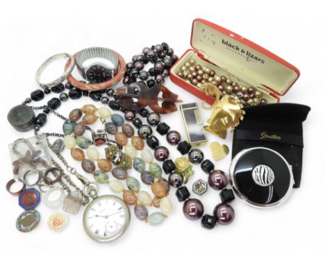 A silver bangle, a Stratton compact, a horse brooch, a real seahorse brooch, garnet crystals and a rutilated quartz palm ston