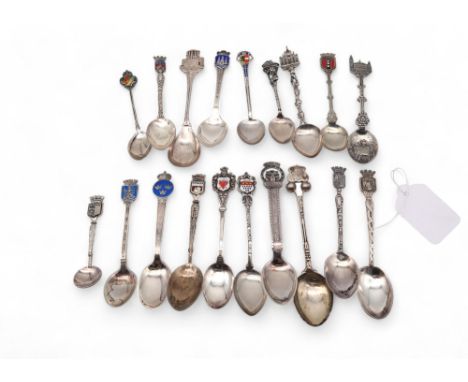 A collection of enamel souvenir spoons, comprising stamped 800 examples, sterling examples, a Norwegian example etc, 216gms (