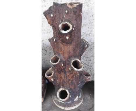 An early 20th century Scottish planter styled as a tree trunk, 117cm high Condition Report:Available upon request