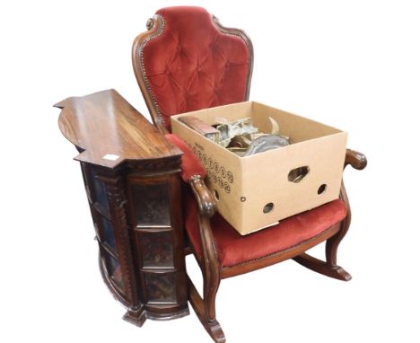 A lot comprising a 20th century button upholstered rocking armchair, a small glazed display cabinet and a box of assorted 20t