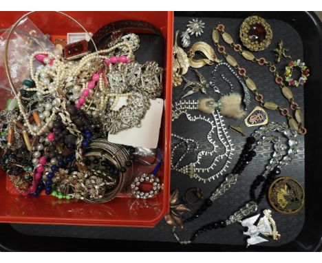 A collection of vintage costume jewellery to include a Royal Scots Dragoon Guards cap badge, a Jakob Bengel style necklace, a