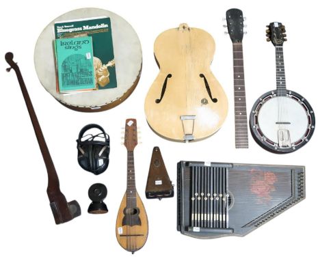 A mixed lot of instruments to include a Pocket Mandolin, a Savana Banjo Mandolin, an Autoharp, a Bodhran Drum, and a Framus W