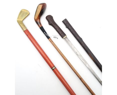 A swagger stick, the scabbard and grip with imitation bark cladding a brass shell casing ferrule, the concealed blade measuri