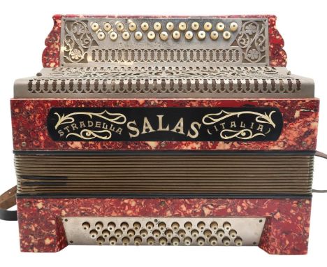 A Stradella Salas Italia Accordion, with 33 buttons and 36 drone buttons both in mother of pearl, extensively decorative gril