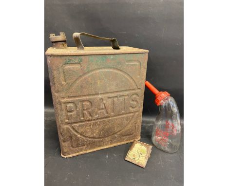 A Pratts two gallon petrol can with Shell cap, a Lucas glass battery filler and a Power petrol letter clip.
