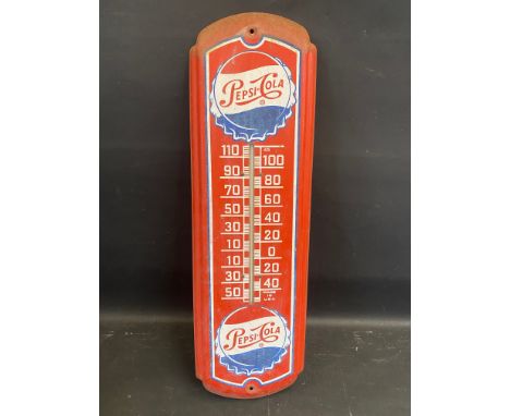 A Pepsi-Cola American tin advertising thermometer, possibly a later issued example, 8 x 27 1/4".