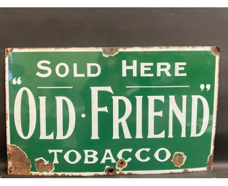 An 'Old Friend' Tobacco rectangular enamel sign, 30 x 18".