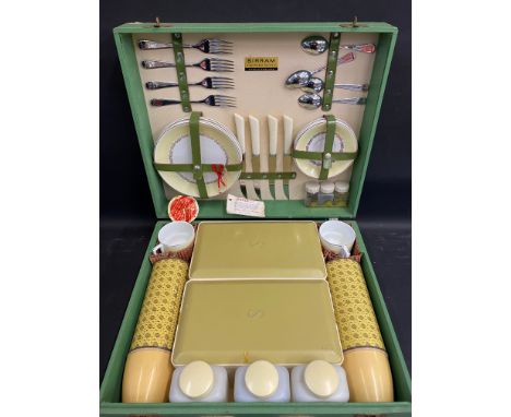 A Marris's Sirram picnic set, no. 1224, circa 1964, internals appear complete, with Aynsley crockery.