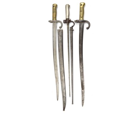 A Chassepot bayonet, Chatellerault 1873 in scabbard; another, no visible markings (blade pitted, no scabbard); a Lebel bayone