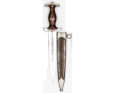 A similar SA dagger,  by Paul Kohl, Solingen with mixed nickel silver and plated mounts, the crosspiece engraved “SA 1939-Mil