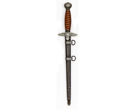 A Third Reich second pattern Luftwaffe officer’s dagger,  by Alcoso, Solingen, with dark orange grip, in its sheath. GC (ligh