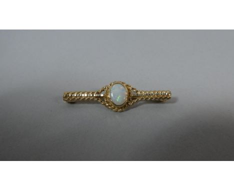 A 9ct Gold and Opal Brooch, 2.3g 