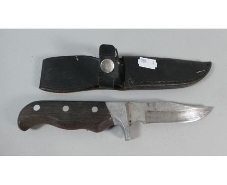 A Daiwa Fishing Knife in Leather Scabbard 