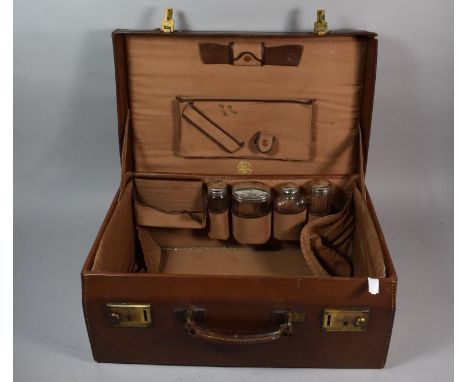 A Vintage Fitted Leather Travelling Case with Silver Topped Bottles by Finnigan, London, 46cm Wide