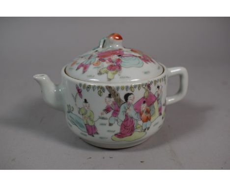 A Small Chinese Teapot Decorated with Applied Enamels Depicting Family Scenes with Peach Finial to Lid and Red Seal Mark to B