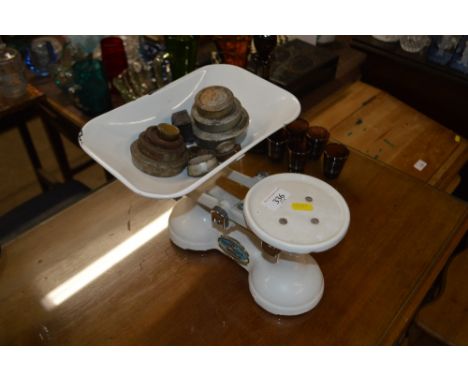 A set of kitchen scales and weights 