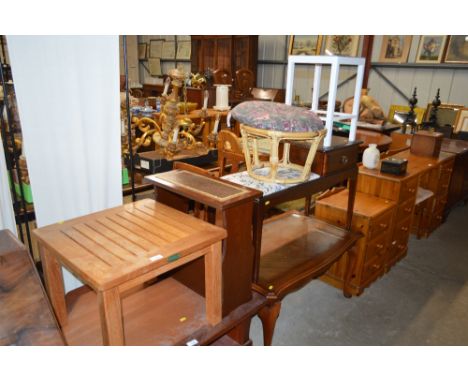 A Westminster teak table; together with a leather inset magazine rack; telephone table; glass inset coffee table; wicker foot