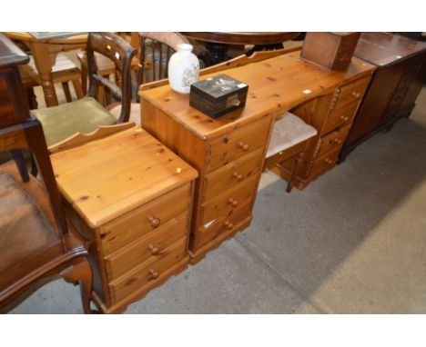 A pine dressing table fitted eight drawers with button upholstered stool and matching bedside chest fitted three drawers 