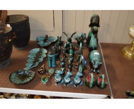 A quantity of Blue Mountain pottery figures, and Poole pottery figures - some AF