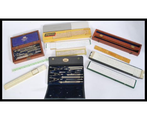 A collection of Draughtsman's tools to include a W. H. Harling Mathematical Instrument&nbsp; set, housed within a mahogany ca