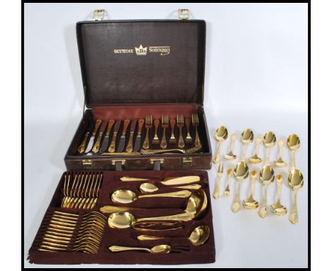 A vintage&nbsp;Solingen of W Germany 23-24 carat gold-plated canteen of cutlery for twelve settings including knives, forks, 
