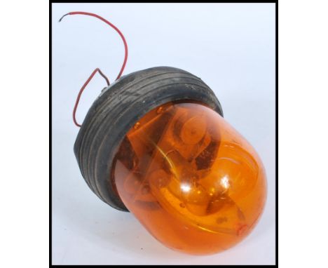 A vintage 20th Century vehicle mounted revolving warning light / lamp by Lucas, retaining original rubber to the base of the 