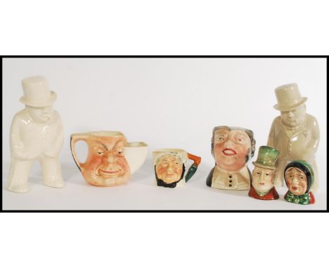 A selection of 20th century pottery to include a pair of Beswick salt and pepper condiments of Dickens characters, two Bristo