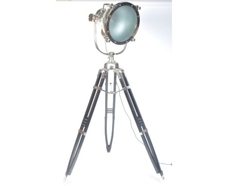 A stunning large contemporary chrome floor light comprising of an oversized theatre / search /cinema light / lamp style top w
