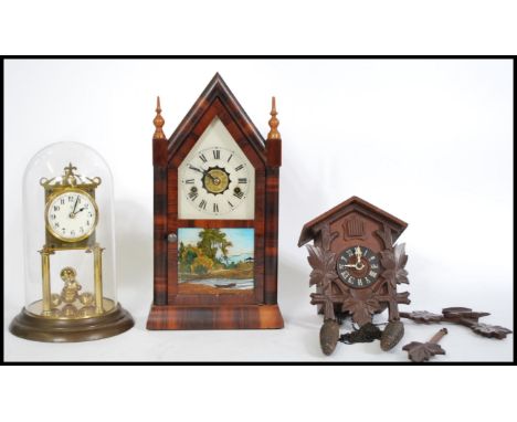 A collection of three vintage clocks to include an anniversary clock, American Gingerbread clock together with a wooden Germa