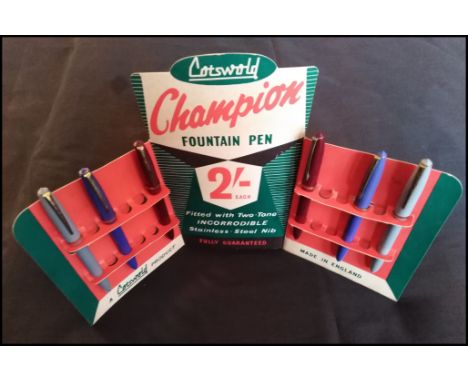 SHOP DISPLAY stand for "Champion" Fountain Pens by Cotswold. A point of sale, card, advertising holder. Contains six of the p