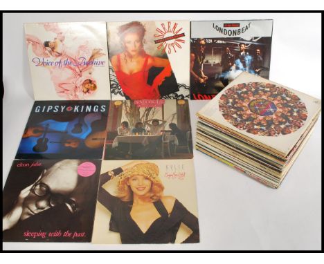 A collection of vintage 1980's vinyl LP records to include Level 42, signed single by Bonk, Shadows, Japan etc. Please see im