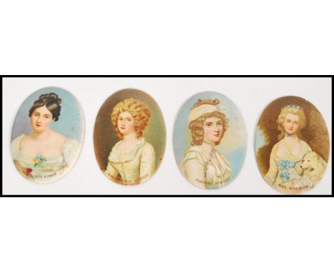 A set of four early 20th century enamelled printed portraits of women on metal oval form discs to include 'Mrs. Robinson', 'P