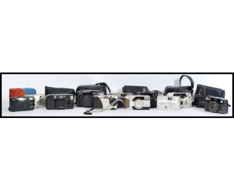 A collection of 20th century film cameras to include a Nikon Lite Touch Zoom 70Ws, a Minolta af-dl, a Minolta zoom 140 riva z