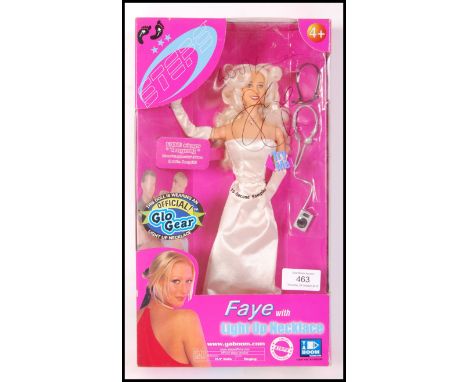 An original Yaboom made ' Steps Faye with Light Up Necklace ' poseable pop star figurine doll. Mint and factory sealed with t