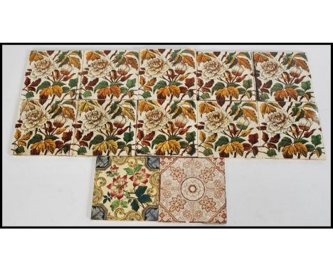 A collection of 19th century Victorian ceramic fireplace tiles in the style of Minton, having a floral peony pattern in autum