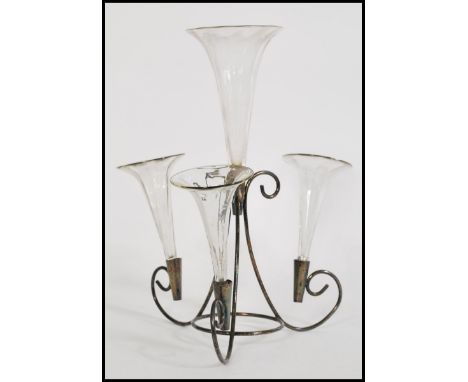 A 19th century Victorian glass and silver plated glass epergne centre piece, having one large central trumpet with three smal