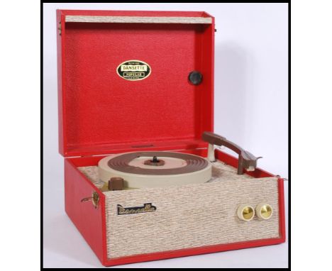 Dansette 'Popular' 1950s portable record player with a beige textured panel to the front and red leatherette to the tops and 