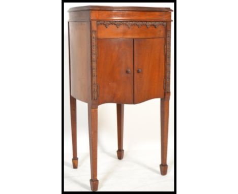 A vintage 20th century Jtonia John Barker Gramophone heart form cabinet raised on four tapering square legs, with twin doors 