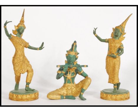 A set of 3 bronze and gilt decorated asiatic - Thai figurine sculptures of Deity's. Each with different shape to include danc