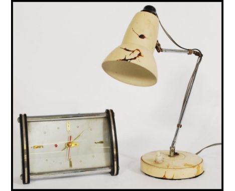 A vintage retro 20th century Diamond clock along with a vintage anglepoise type desk lamp on circular base with adjustable ch