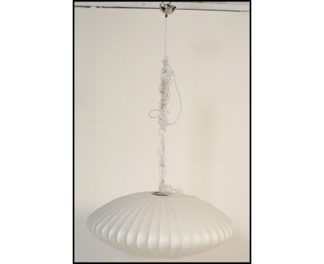 After George Nelson - Bubble Saucer Light - A contemporary ceiling wall lamp / light fixture. The light consisting of a wire 