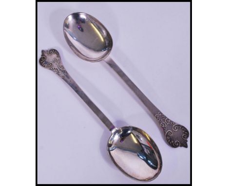 A pair of&nbsp; Britannia standard silver anointing spoons by Thomas Bradbury &amp; Sons, London hallmarks, the handle and ba