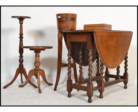 A collection of items to include a 1920's oak barrel planter with brass bindings together with a cased canteen of cutlery,vin